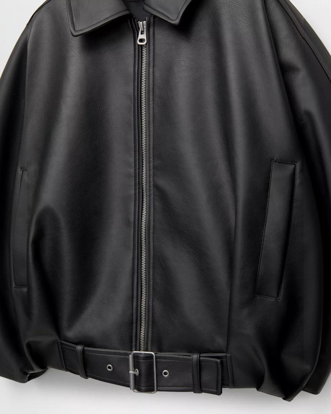Luna Moda Alessandra black faux leather jacket with a front zipper and adjustable waist belt