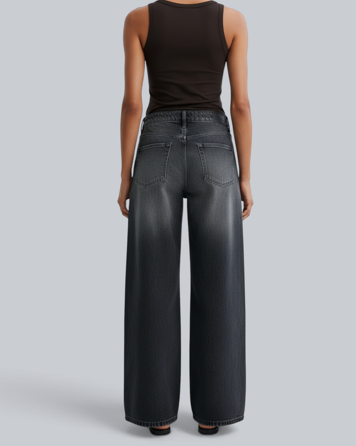 Luna Moda FULVIA high-waisted baggy jeans in a vintage washed black denim with a relaxed wide-leg fit, back view.
