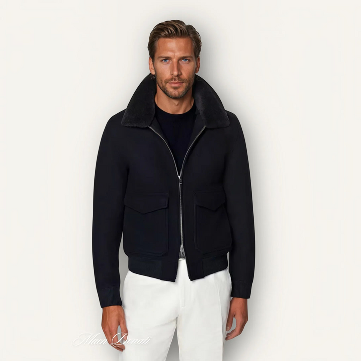 Luna Moda black bomber jacket in vegan wool blend with a detachable shearling collar worn by a male model.