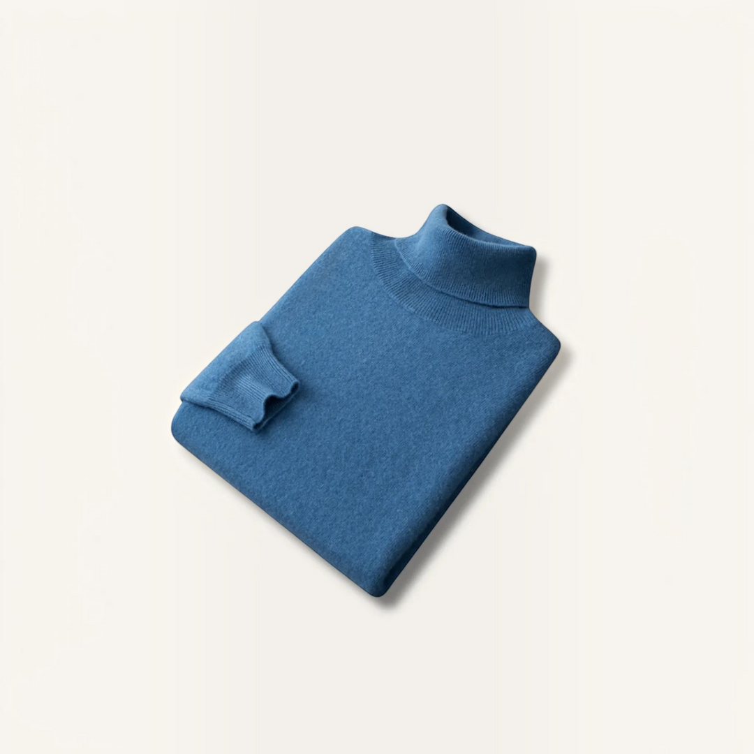 Luna Moda David blue 100% cashmere turtleneck sweater with ribbed collar and cuffs, folded flat.