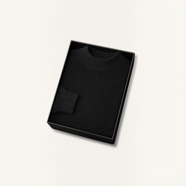 Luna Moda black cashmere and wool blend sweater with ribbed cuffs neatly folded inside a black gift box