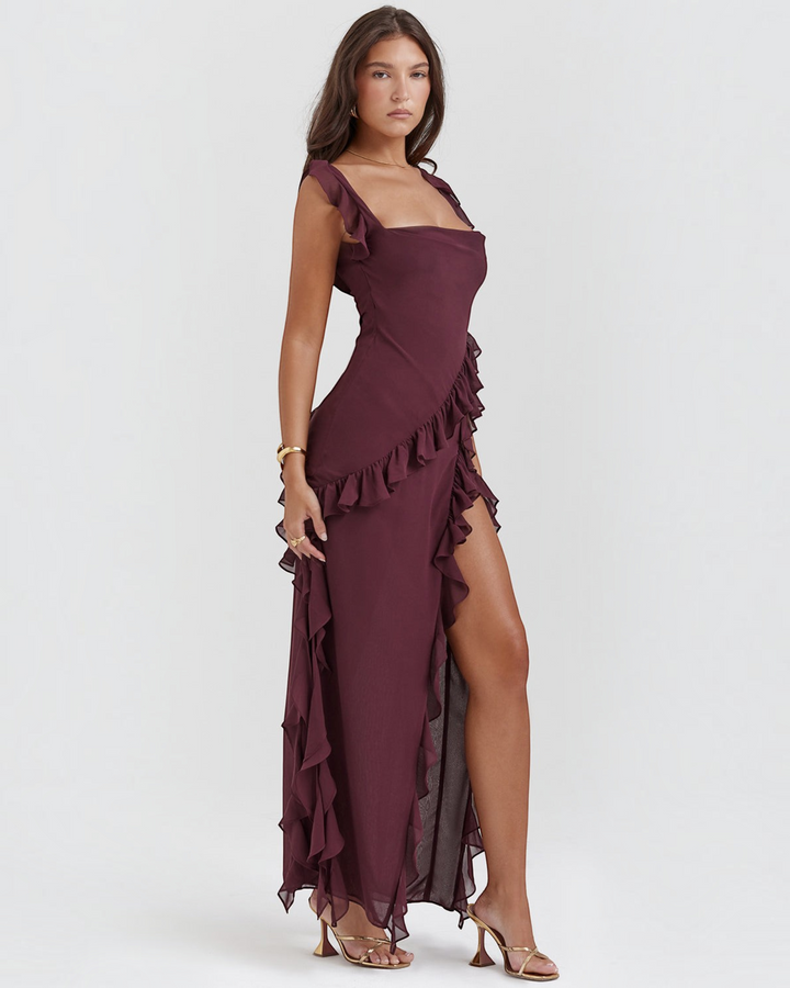 Luna Moda Andrea burgundy maxi dress with ruffled trim, square neckline, and high leg slit on a model