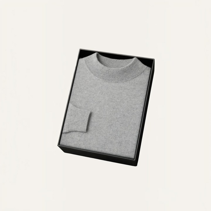 Luna Moda grey cashmere and wool blend sweater with ribbed collar and cuffs, neatly folded in a black gift box.