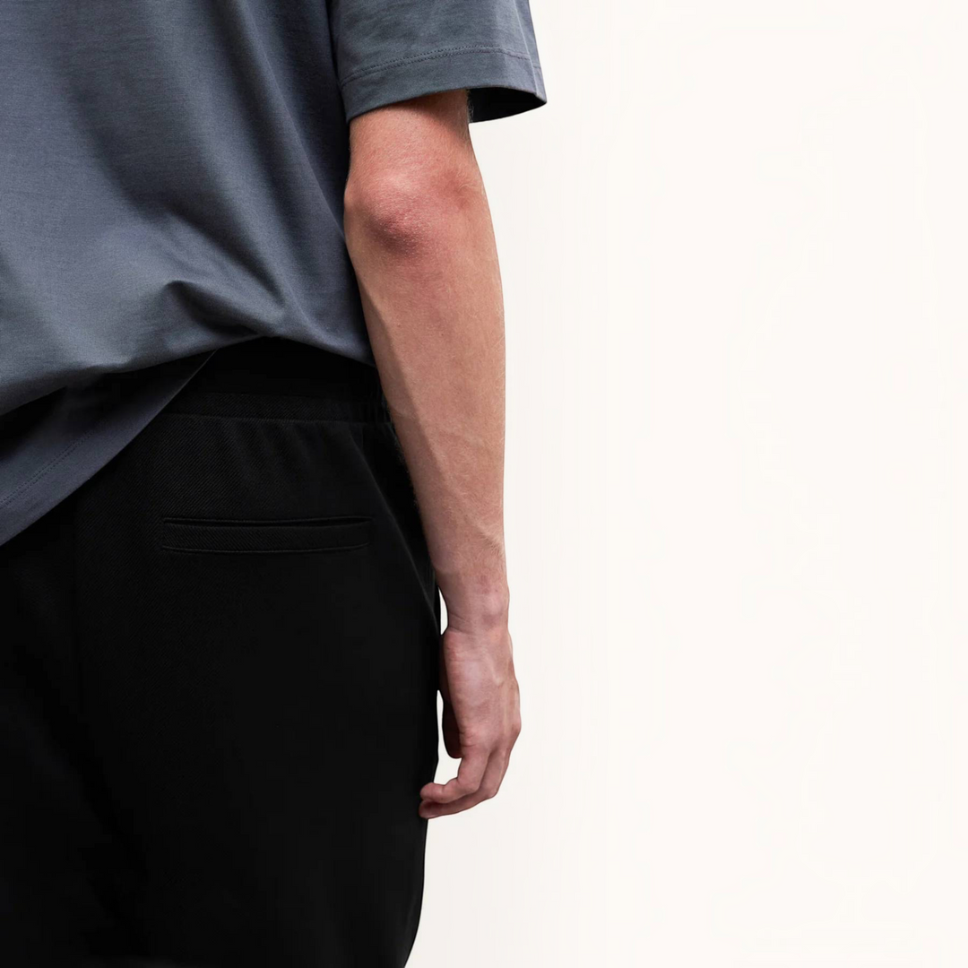 Luna Moda regular fit black trousers made with recycled polyester blend, featuring a comfortable stretch design.