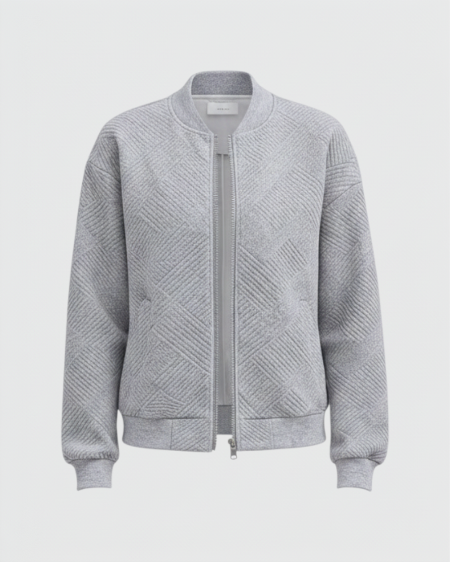 Luna Moda Dora grey bomber jacket with a subtle geometric textured pattern, front zip closure, and ribbed cuffs.
