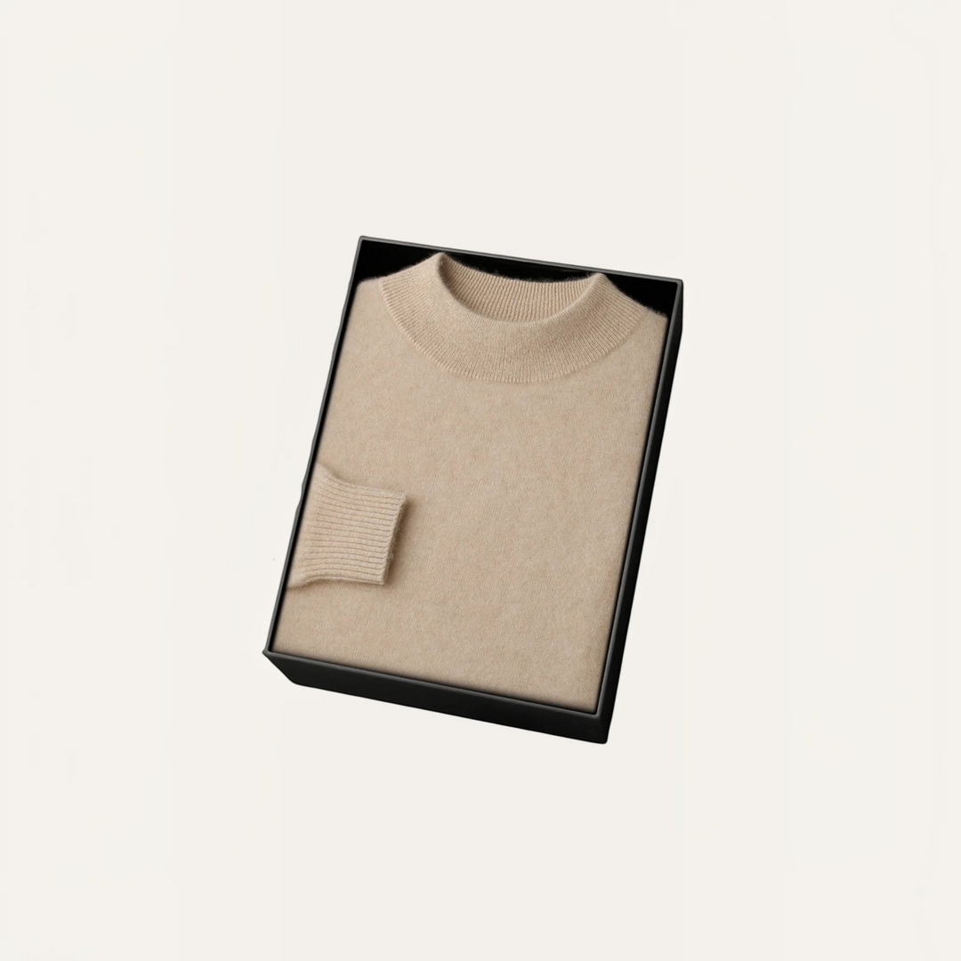 Luna Moda beige cashmere and wool blend sweater with ribbed collar and cuffs, neatly folded in a black gift box.