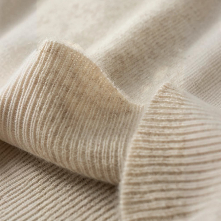 Luna Moda David beige 100% cashmere turtleneck sweater featuring a soft ribbed knit texture and high collar detail.