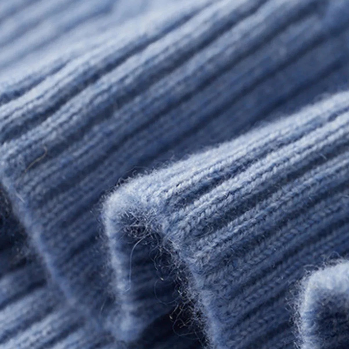 Luna Moda blue ribbed turtleneck sweater made from a soft cashmere and wool blend with a textured knit finish.