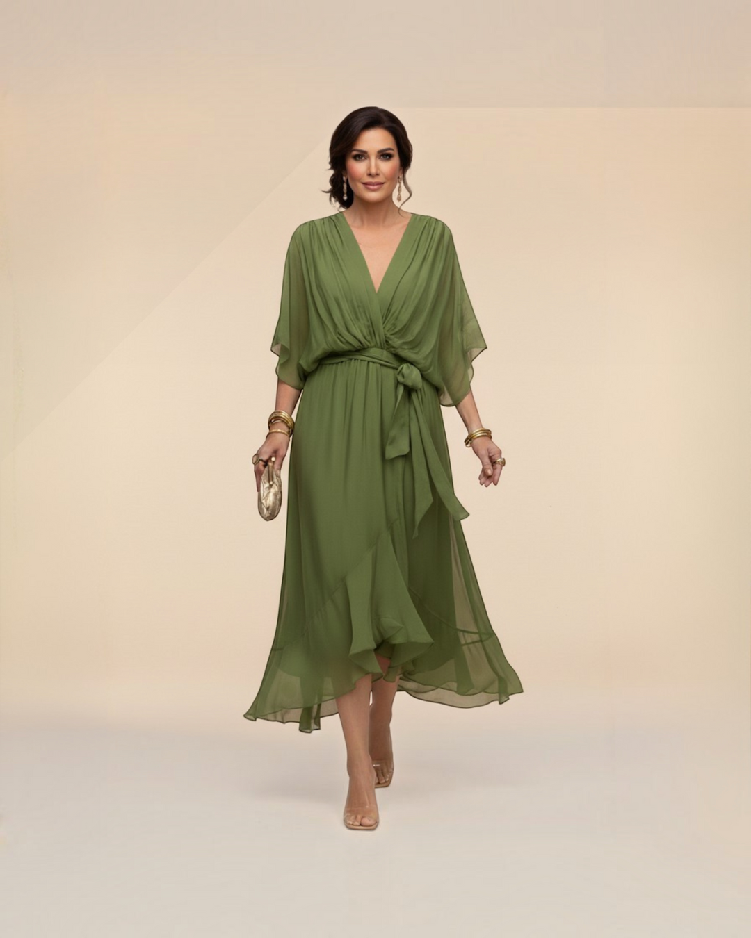 Luna Moda Monica olive green chiffon midi dress with V-neck and tie waist worn by a woman on a neutral background