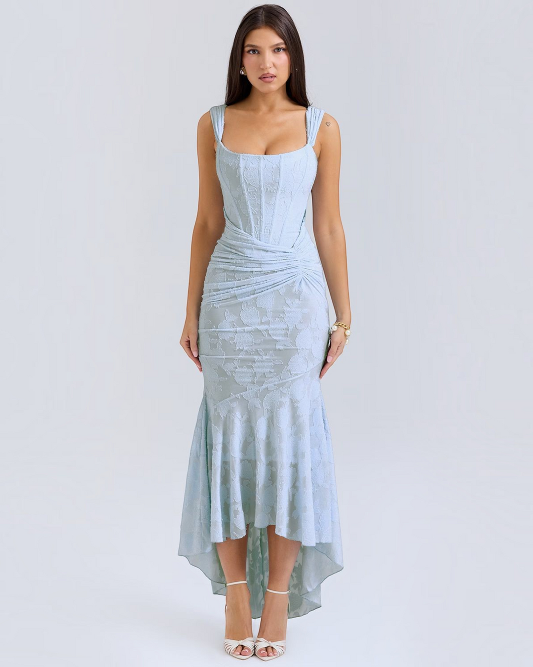 Luna Moda Katerina light blue floral midi dress with a corset bodice, ruched waist, and high-low hem on a model.
