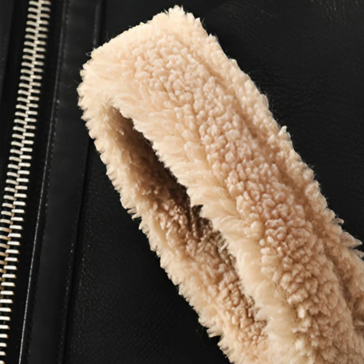 Luna Moda black aviator jacket sleeve detail with beige faux shearling lining and silver metal zipper