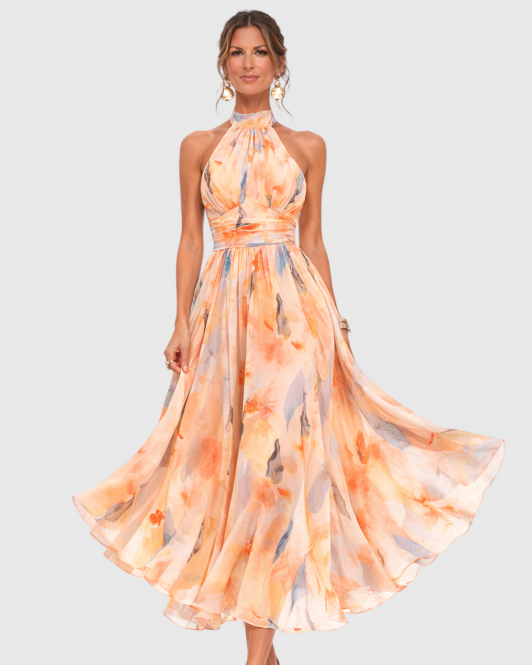 Luna Moda Aurora maxi dress with halter neck and artistic peach and blue watercolor floral print on flowing fabric
