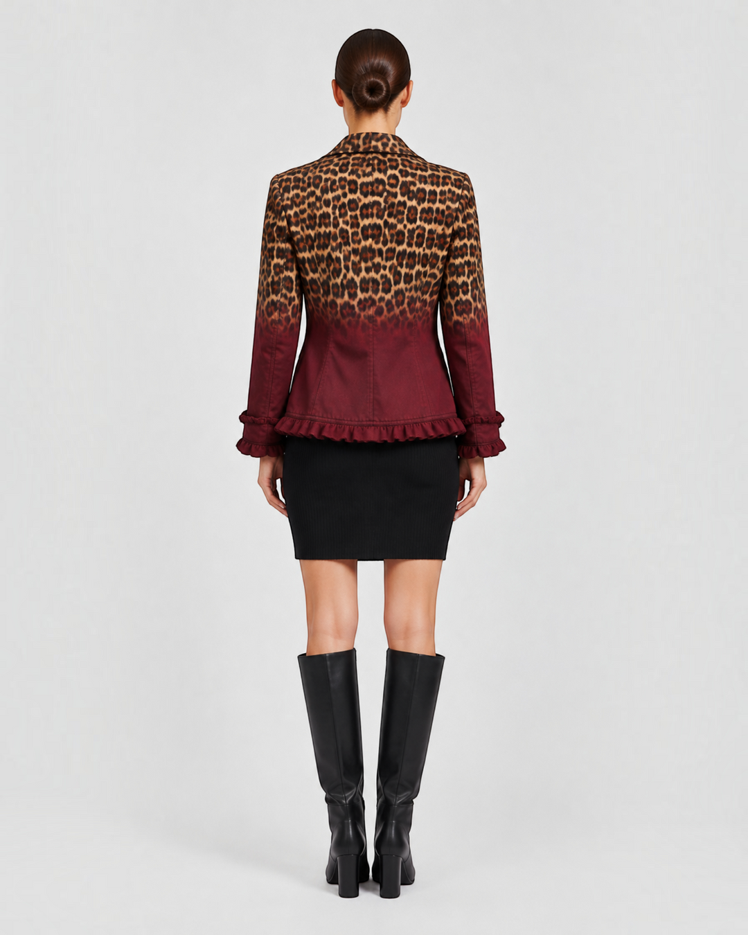 Luna Moda Emma blazer featuring a leopard print ombre design with ruffled hem and cuffs, back view on a model.
