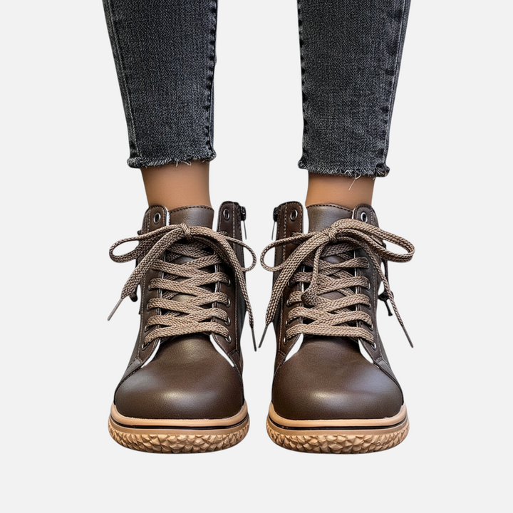 Luna Moda EDUARDA brown leather ankle boots with lace-up front and textured rubber soles worn with grey jeans