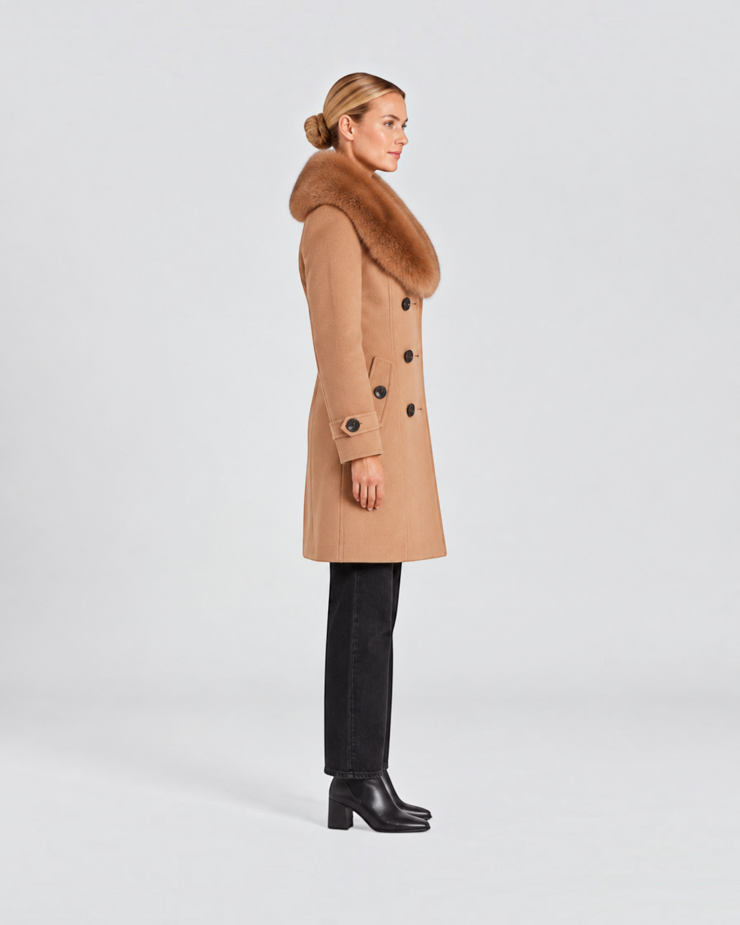 Luna Moda short camel coat with faux fur collar and double-breasted buttons worn by a model in profile view