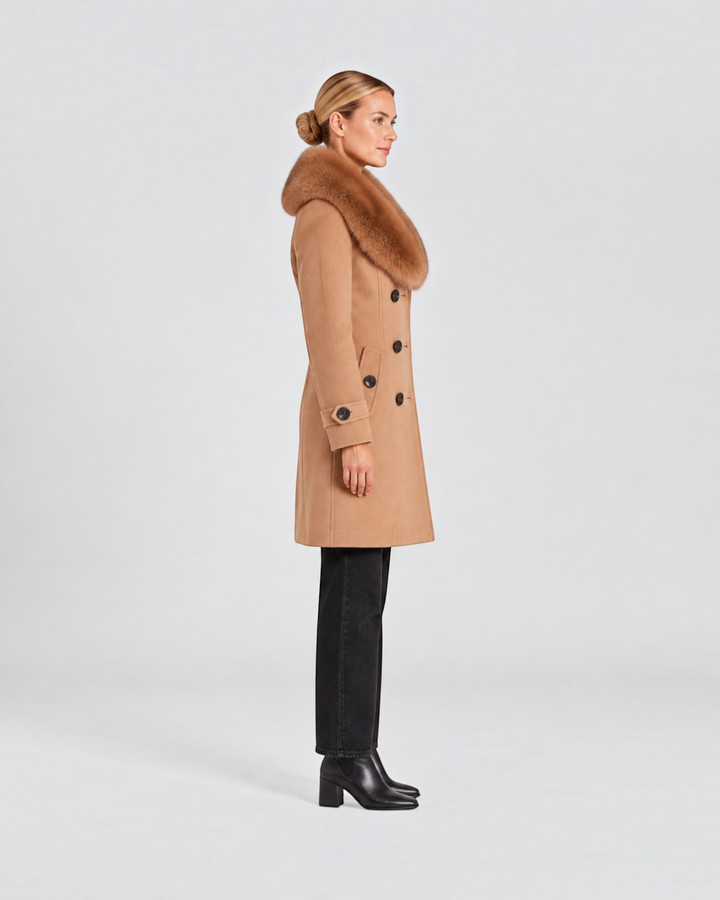 Luna Moda short camel coat with faux fur collar and double-breasted buttons worn by a model in profile view