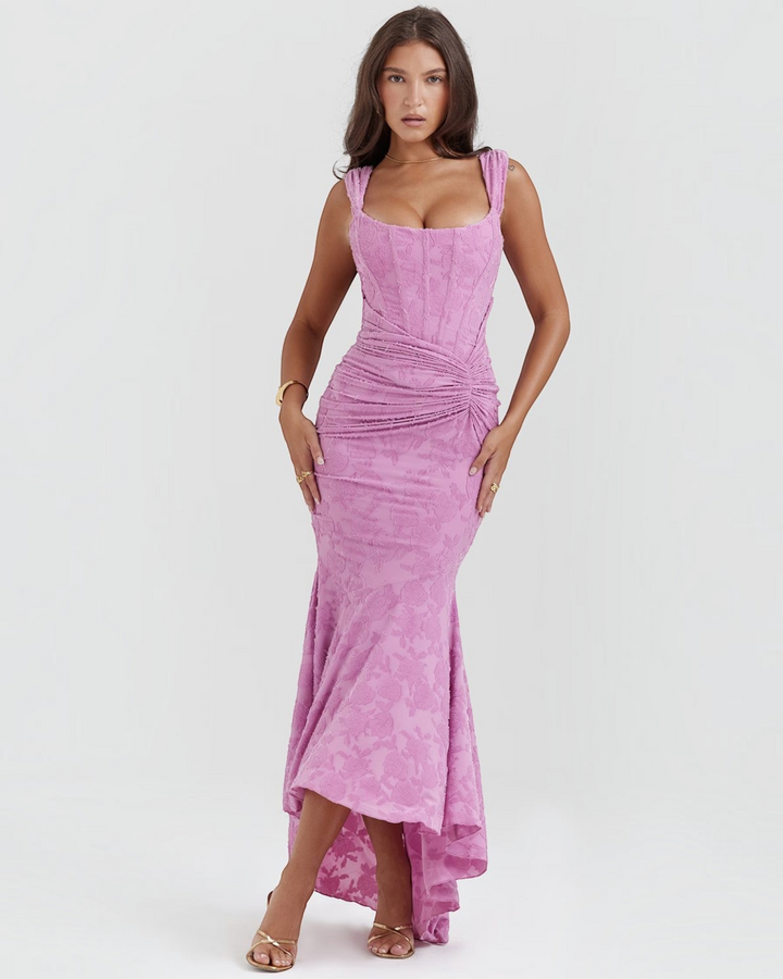 Luna Moda Katerina pink floral jacquard midi dress with corset-style bodice and ruched waist on a model