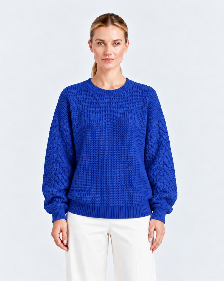 Luna Moda royal blue sweater with a ribbed body and textured cable knit sleeves, featuring a classic crew neck.