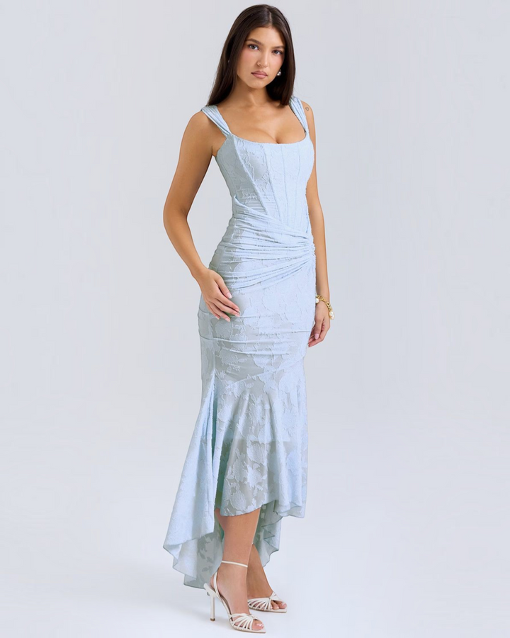 Luna Moda Katerina light blue floral midi dress with corset bodice, ruched waist, and high-low hem on a model.