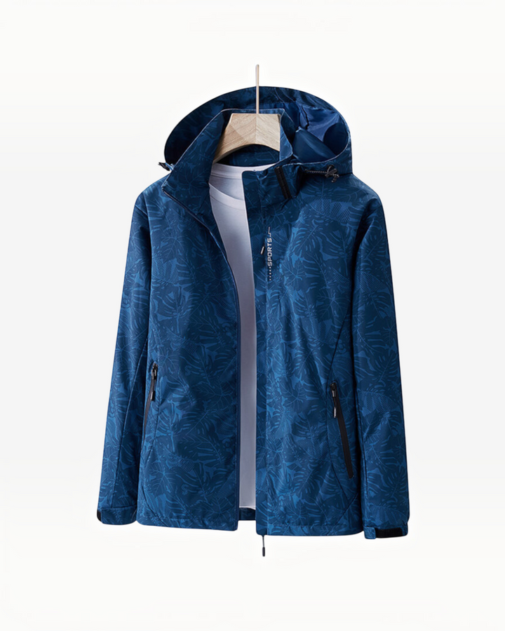 Luna Moda Eufemia lightweight blue waterproof hooded jacket with tropical leaf pattern and zippered pockets