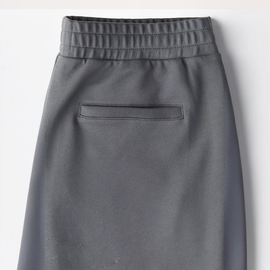 Luna Moda grey regular fit trousers featuring an elasticated waistband and a single back welt pocket.