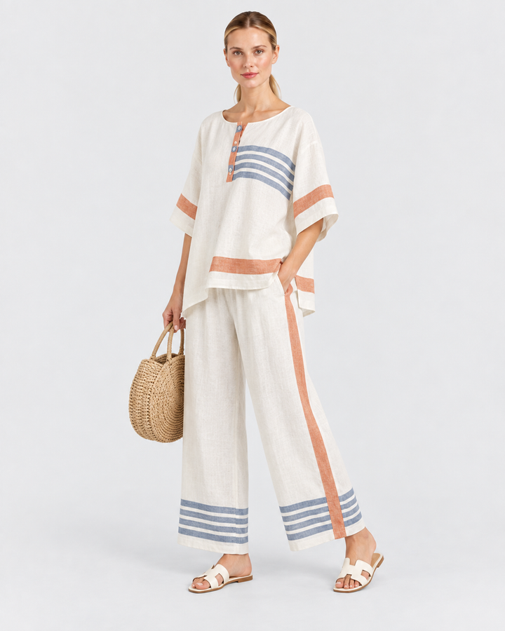 BRUNA – Completo ampio a margherite