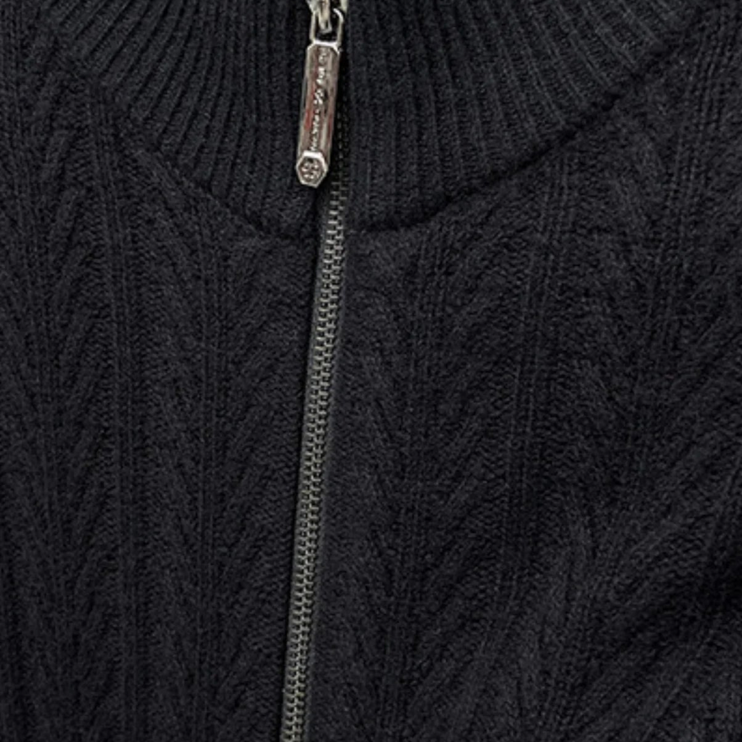 Luna Moda Regalia black pure wool sweater featuring a ribbed texture and a smooth front zip closure.