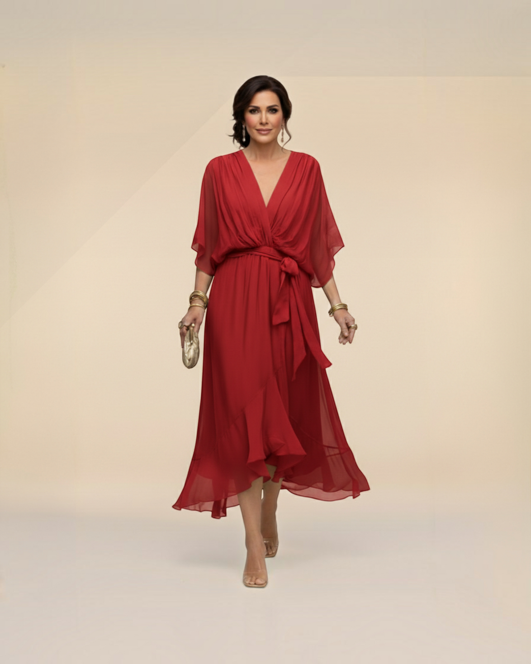 Luna Moda Monica red chiffon midi dress with V-neck, draped waist tie, and flowing skirt on a model