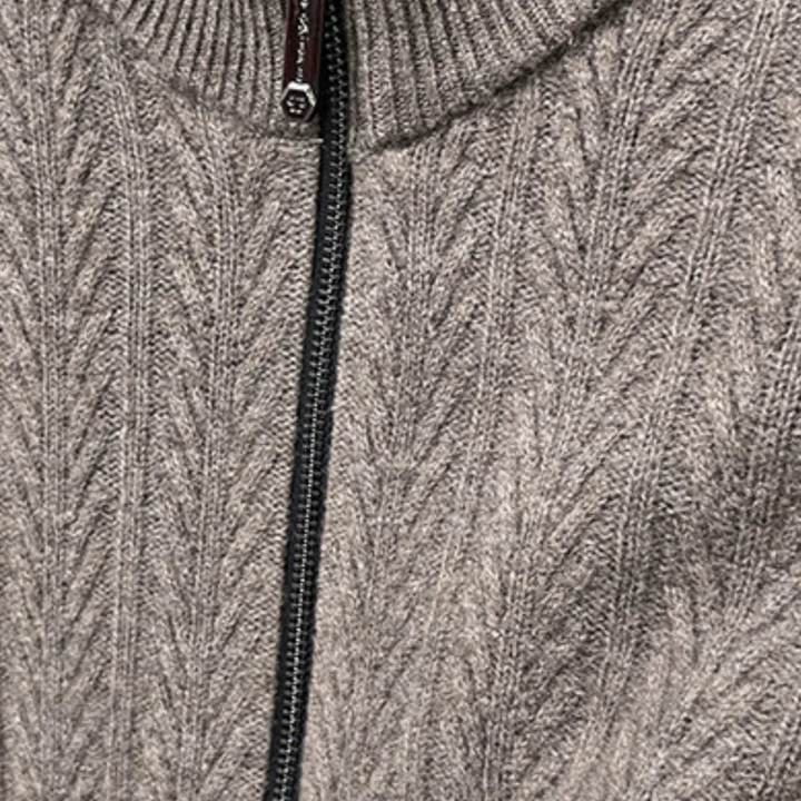 Luna Moda Regalia grey wool sweater featuring a textured ribbed pattern and a smooth front zip closure