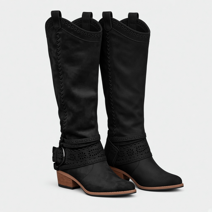 Luna Moda black suede cowboy boots with decorative buckles, intricate laser-cut details, and stable low block heels.