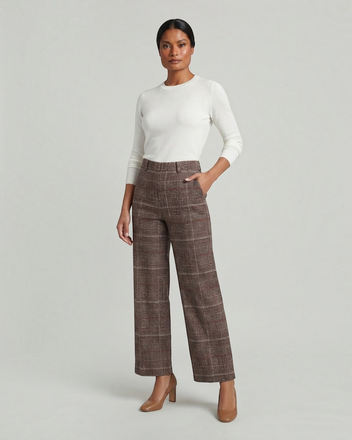 Luna Moda high-waisted wide-leg trousers in a brown plaid pattern, styled with a white long-sleeve top and heels.