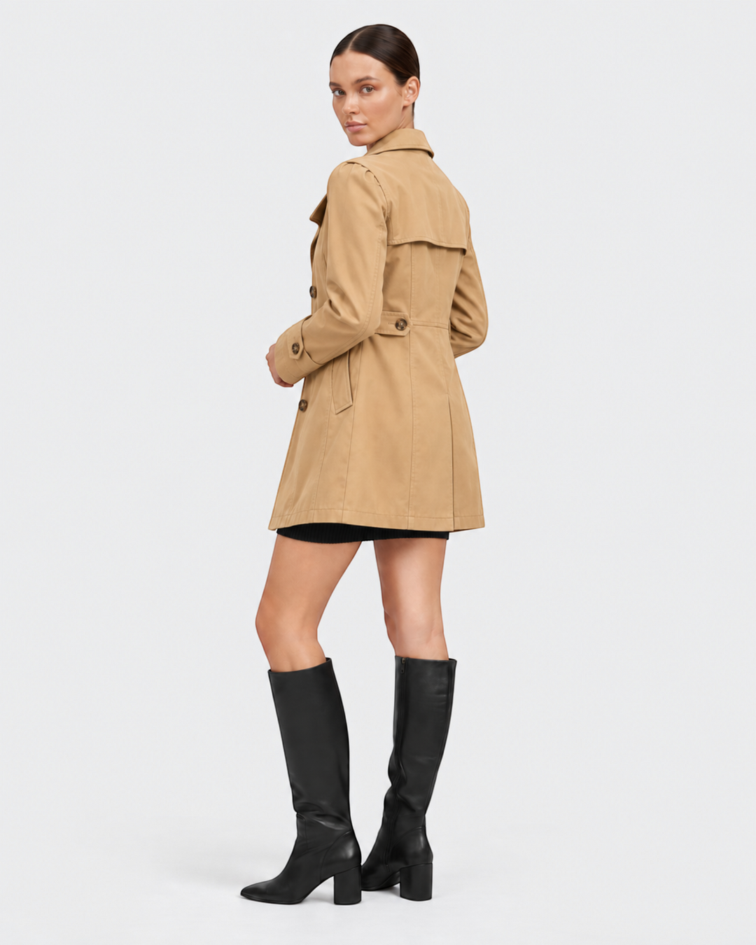 Luna Moda beige flared trench coat in lightweight gabardine worn by a model with black knee-high boots