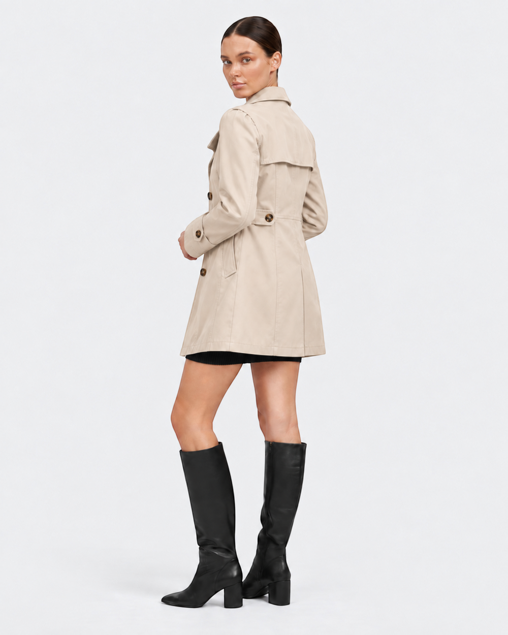 Luna Moda Annunziata lightweight beige flared trench coat worn by a model with black knee-high boots