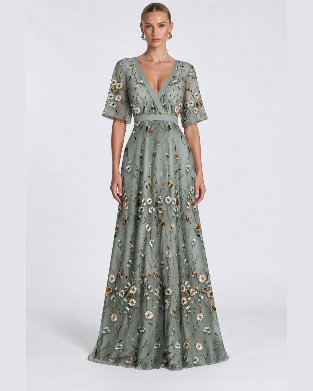 Luna Moda long sage green evening dress with V-neck, short sleeves, and delicate floral embroidery on sheer fabric.