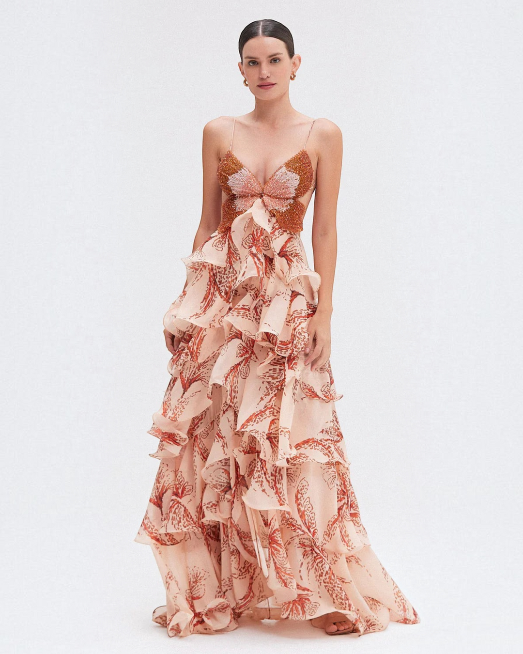 Luna Moda Nahia bohemian maxi dress with ruffled skirt, butterfly-shaped beaded bodice, and floral print in peach