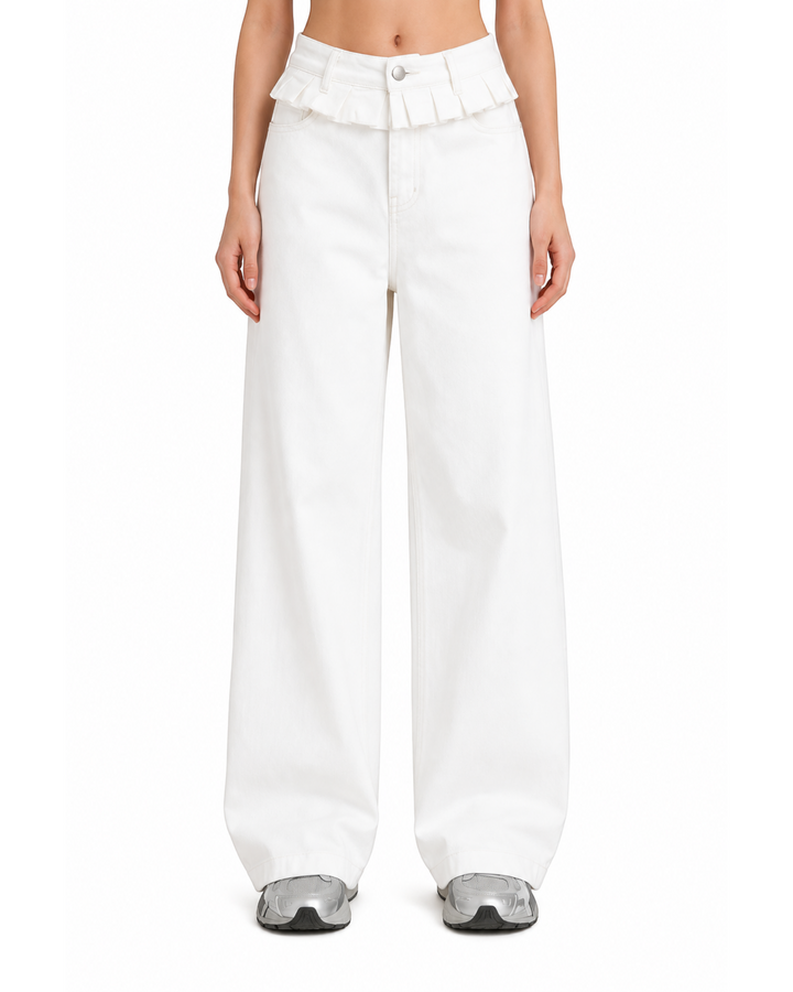 Luna Moda white wide-leg jeans featuring a decorative ruffled lace-trimmed waistband on a model