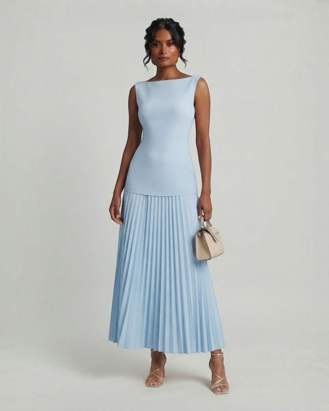 Luna Moda Celeste sleeveless maxi dress in light blue with a structured bodice and pleated skirt on a model