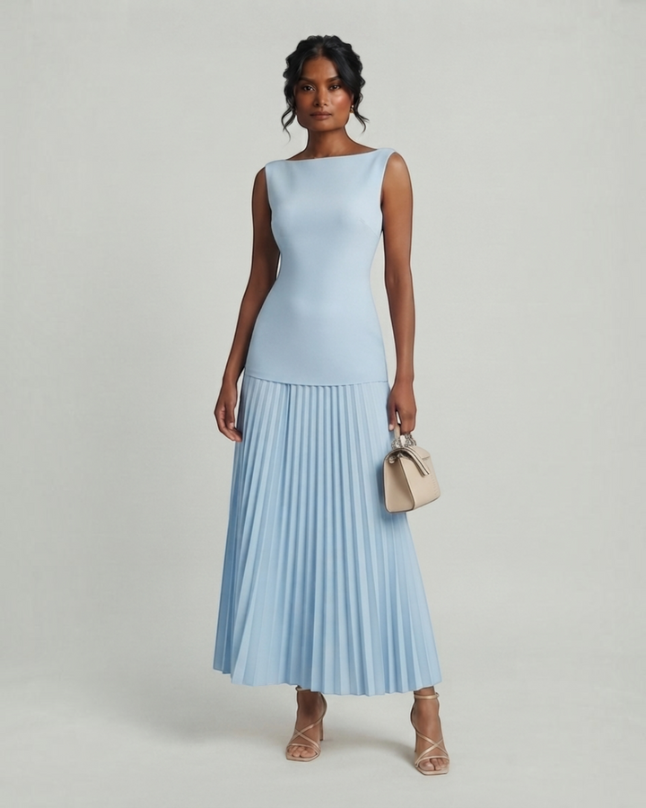 Luna Moda Celeste sleeveless maxi dress in light blue with a structured bodice and pleated skirt on a model