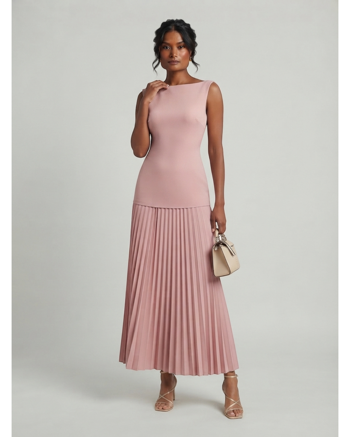 Luna Moda Celeste maxi dress in dusty pink with a sleeveless bodice and a flowing pleated skirt on a model.