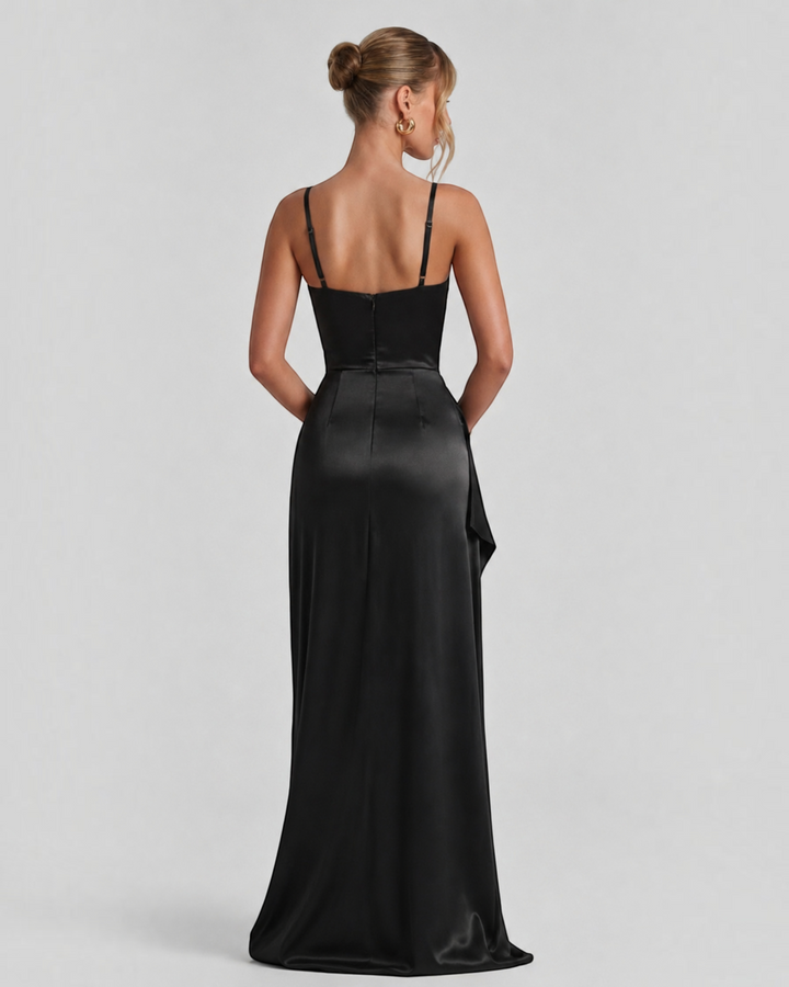 Luna Moda black satin maxi dress with thin crisscross straps and high slit, back view on a model