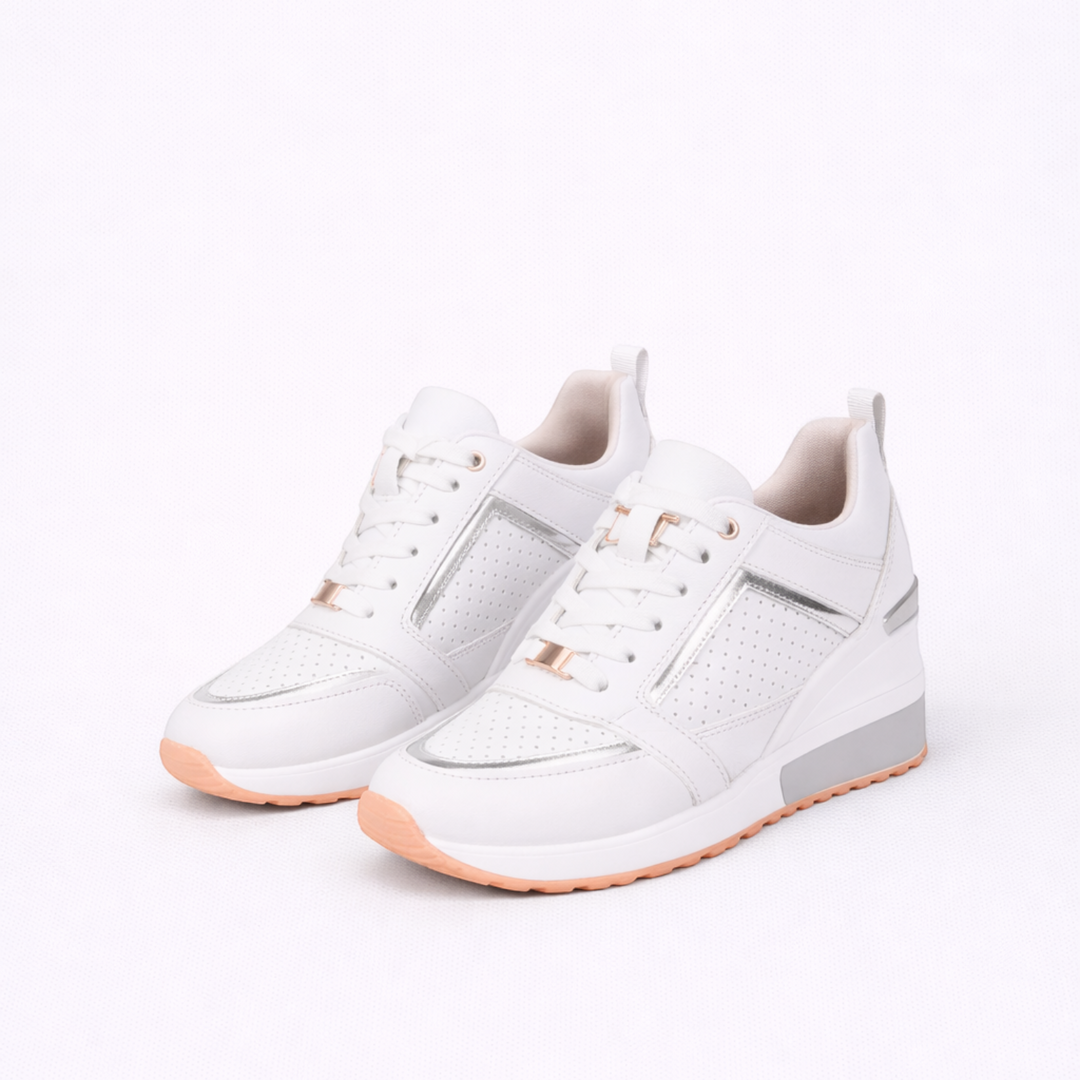 Luna Moda Martina white wedge sneakers with perforated details, metallic silver accents, and a peach-toned outsole.