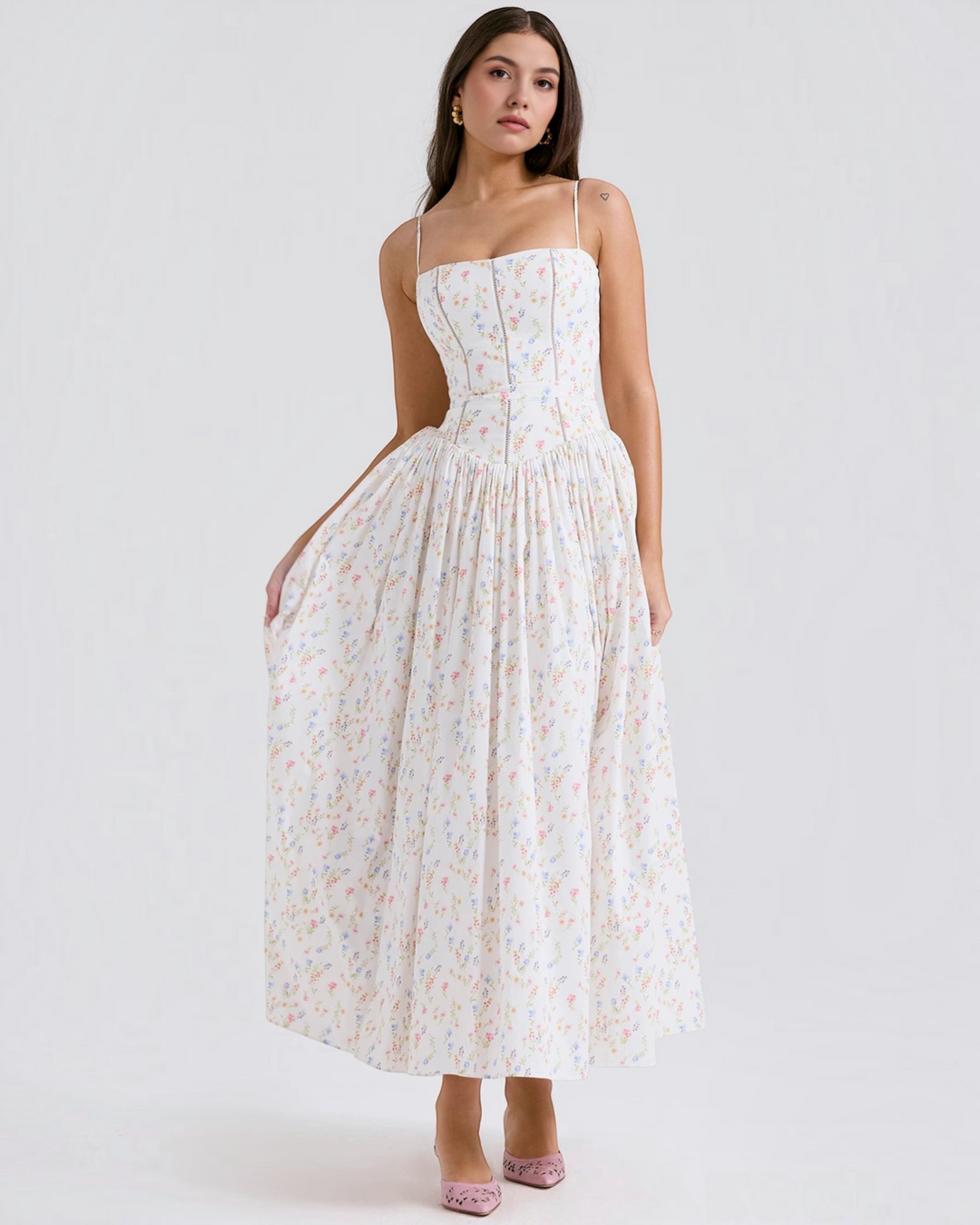 Luna Moda Violetta midi dress featuring a white fabric with delicate floral print, corset bodice, and full skirt.