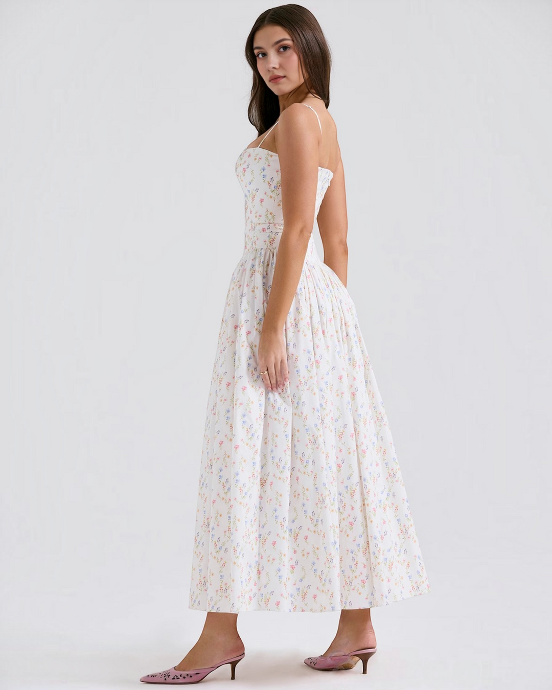 Luna Moda Violetta midi dress with a white base and delicate floral print, featuring a fitted bodice and flared skirt