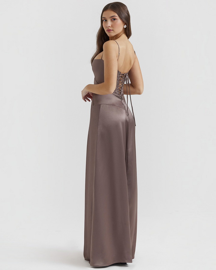 Luna Moda Noelle satin evening gown with a corset-style lace-up back, thin straps, and a flowing floor-length skirt.