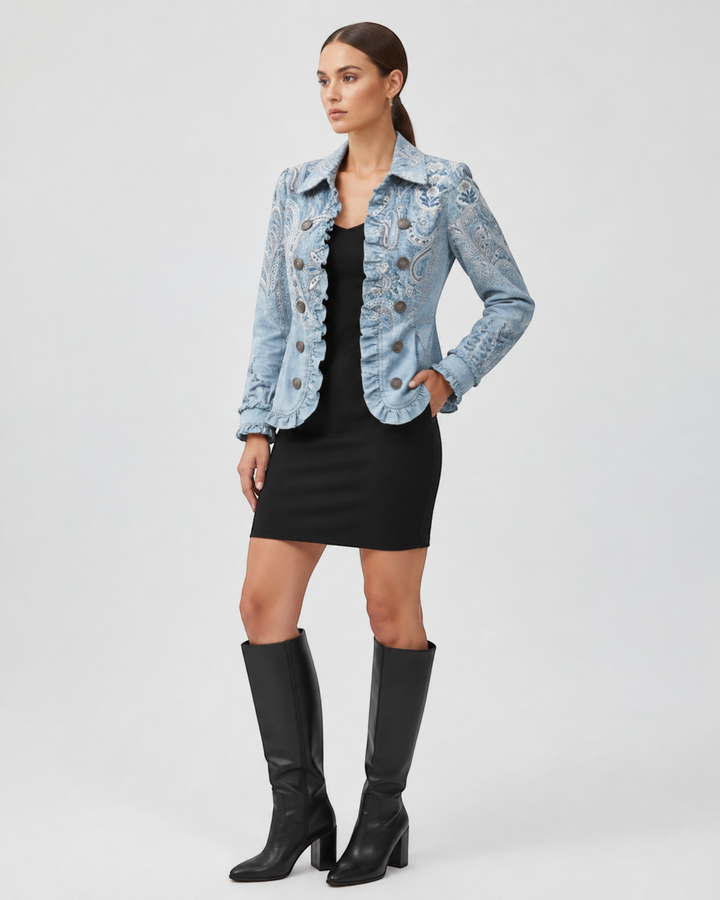 Luna Moda Emanuela jacket in light blue with paisley pattern, ruffle trim, and vintage buttons worn over black dress.