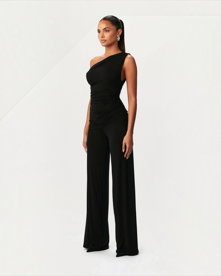 Luna Moda black asymmetric one-shoulder top and wide-leg trousers set with side ruching on a model
