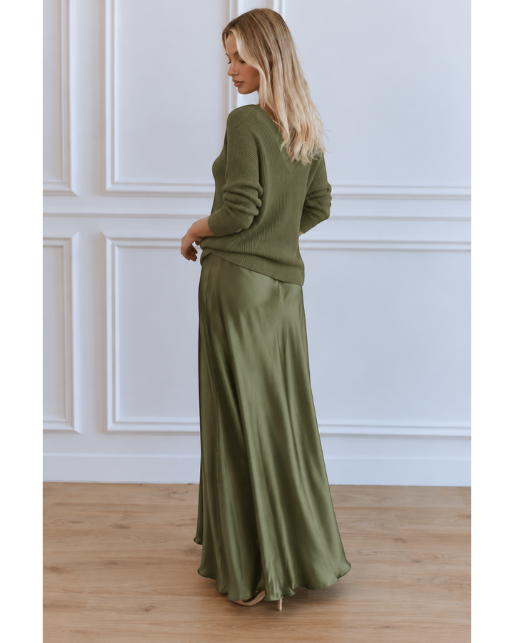 Luna Moda olive green satin midi dress paired with a matching knit sweater on a blonde model