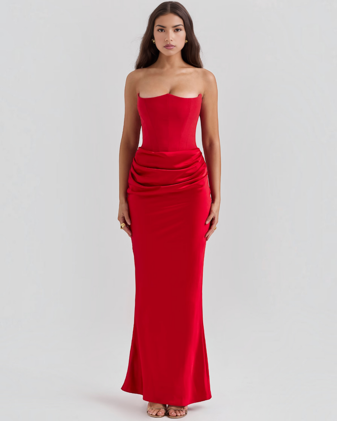 Luna Moda red strapless evening gown with a structured corset bodice and elegant side-draped waist detail