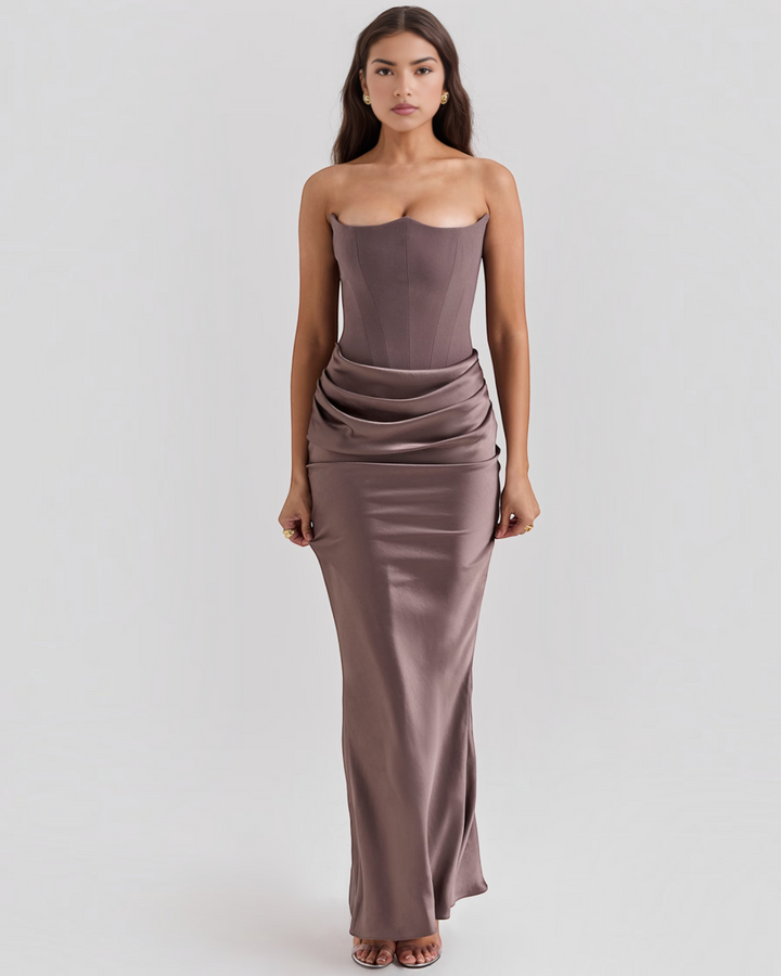 Luna Moda Leilani strapless evening gown in taupe with a structured corset bodice and elegant side-draped skirt.