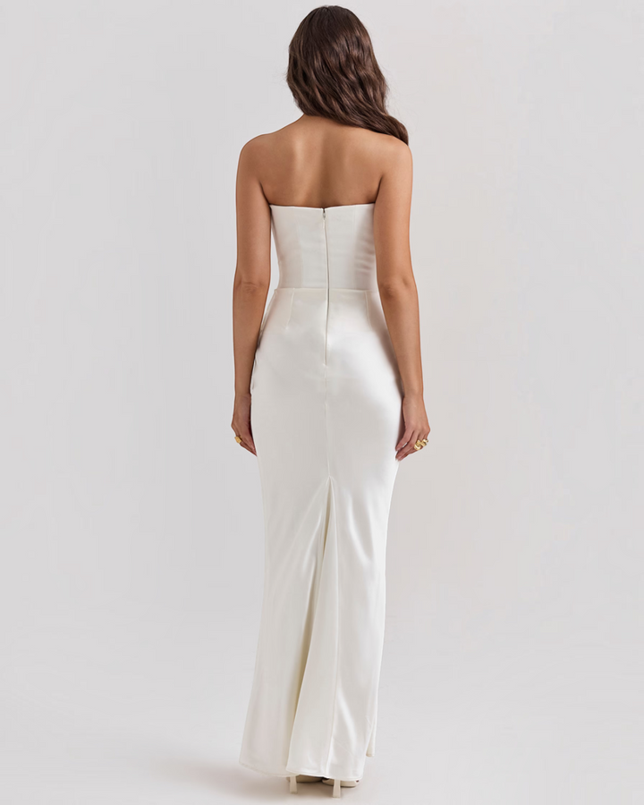 Luna Moda white strapless evening gown with a sleek floor-length silhouette and invisible back zipper closure.